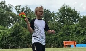 camper with nerf gun at nerf sports camp