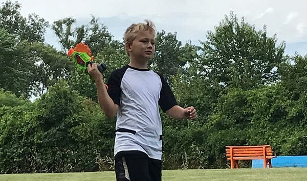 camper with nerf gun at nerf sports camp