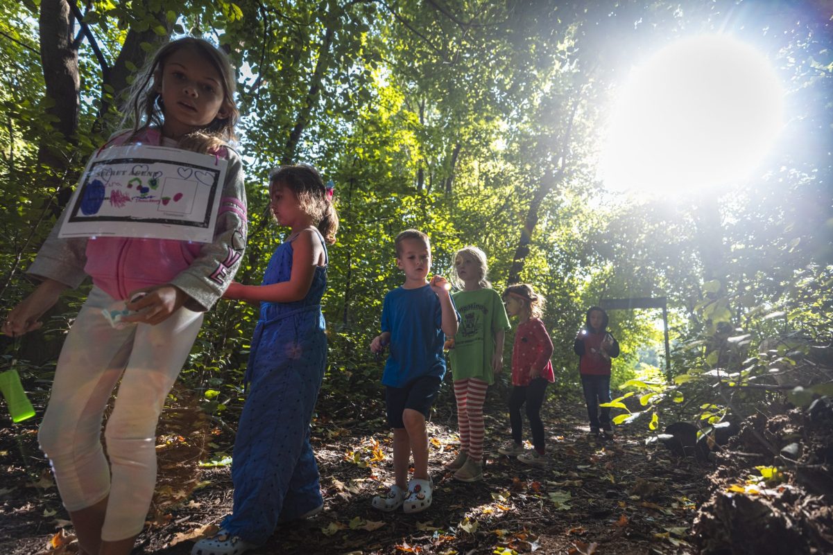 campers exploring woods