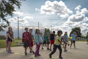 kids playing pickleball at camo